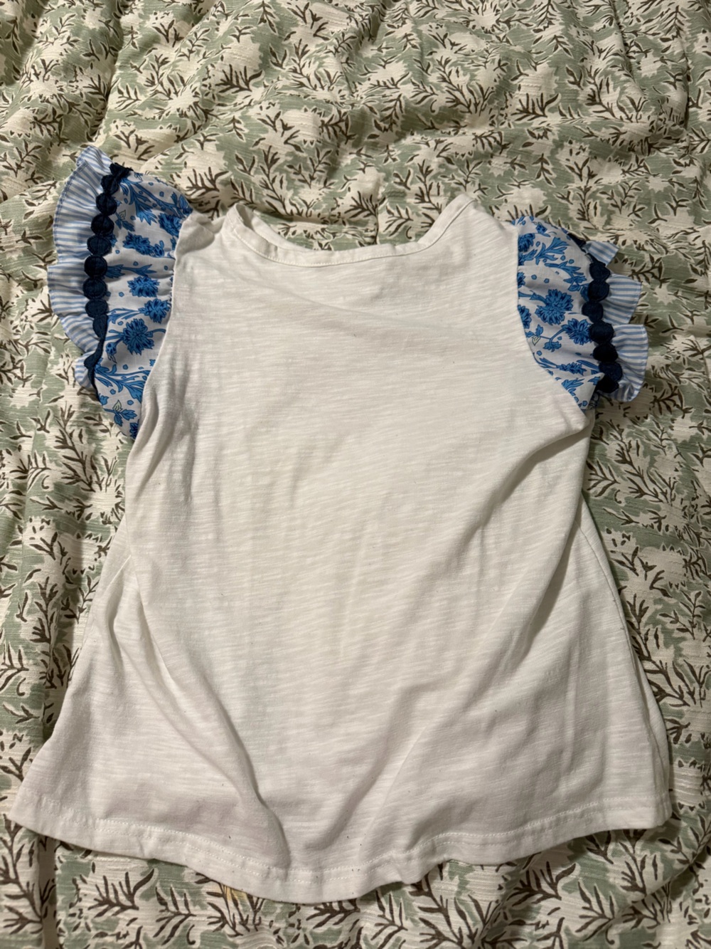 White Women's Ruffle Sleeve Top with Blue Floral Accents